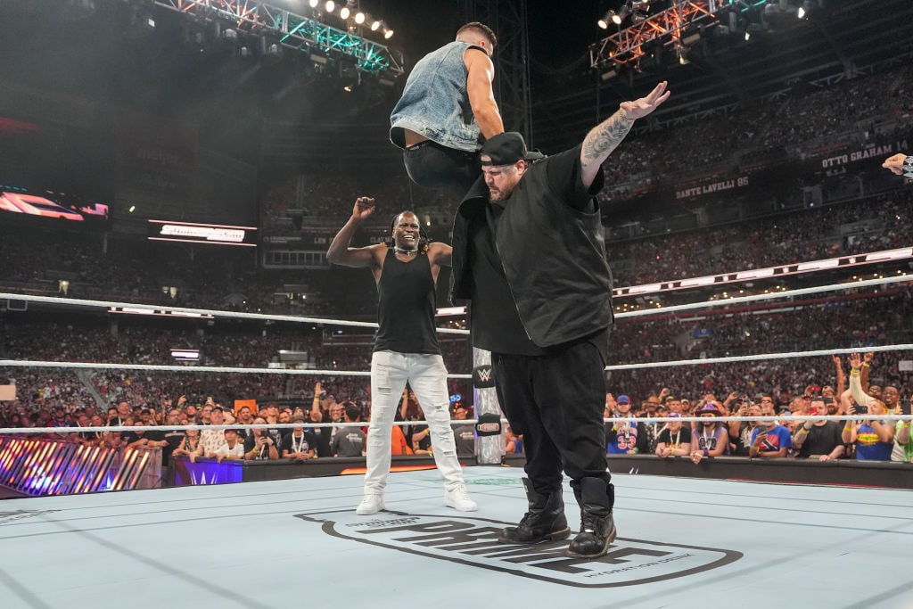 CLEVELAND, OHIO - AUGUST 03: Jelly Roll chokeslams Austin Theory during SummerSlam at Cleveland Browns Stadium on August 3, 2024 in Cleveland, Ohio. (Photo by WWE/Getty Images)