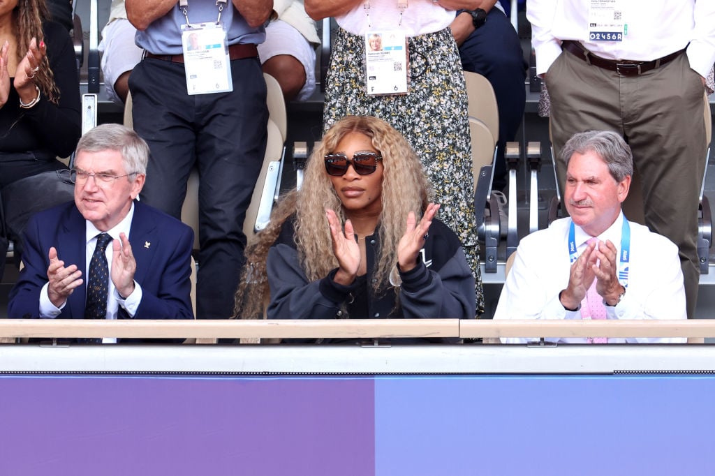 PARIS, FRANCE - AUGUST 04: Thomas Bach, Serena Williams and David Haggerty attend the Men's Singles Gold medal match between Carlos Alcaraz of Team Spain and Novak Djokovic of Team Serbia on day nine of the Olympic Games Paris 2024 at Roland Garros on August 04, 2024 in Paris, France. (Photo by Arturo Holmes/Getty Images)