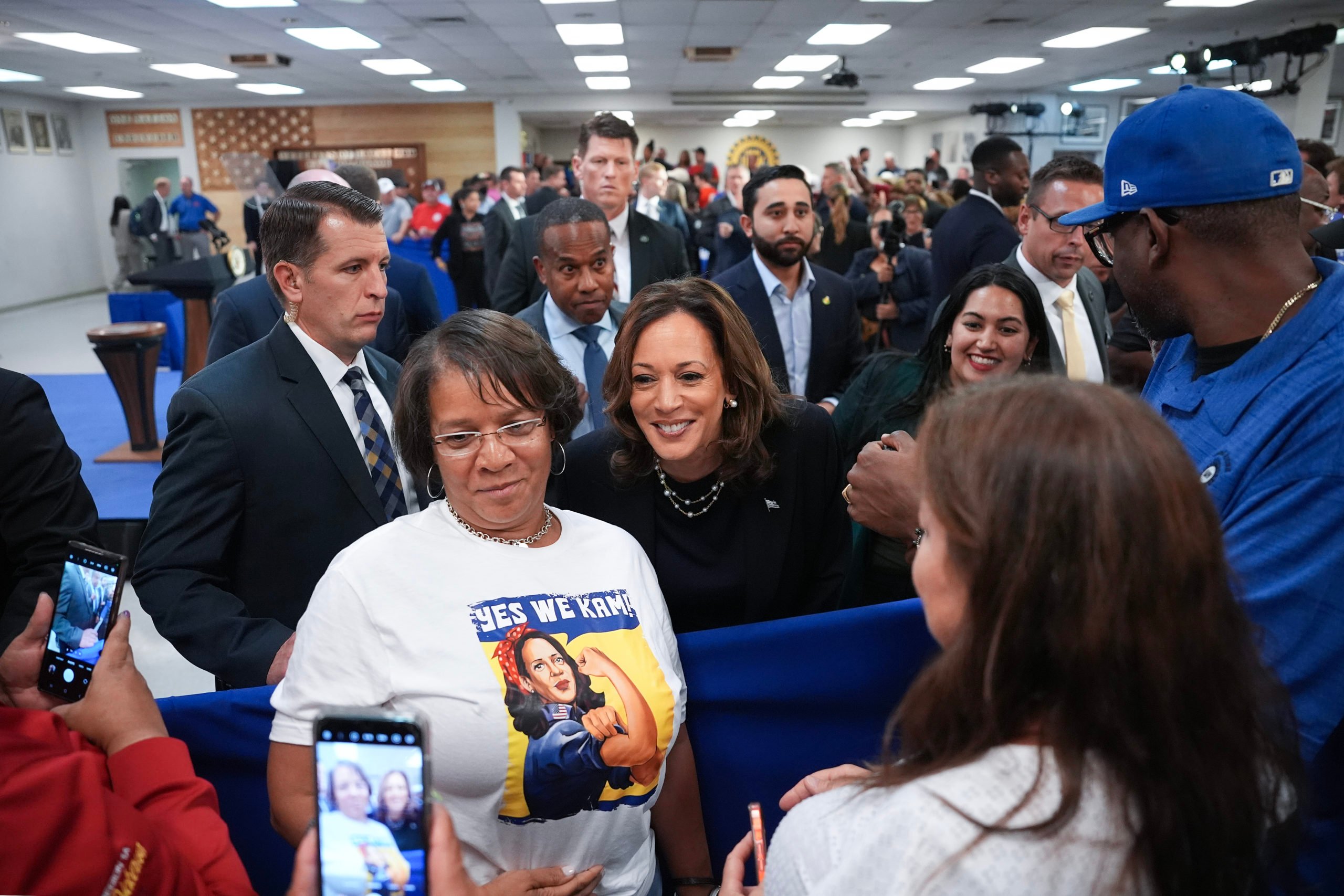 Democratic presidential candidate U.S. Vice President Kamala Harris greets audience members at a campaign rally at United Auto Workers Local 900 on August 8, 2024 in Wayne, Michigan. Kamala Harris and her newly selected running mate Tim Walz are campaigning across the country this week. (Photo by Andrew Harnik/Getty Images)