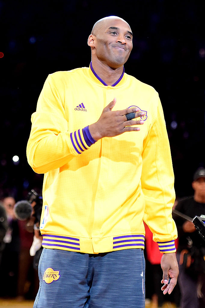 LOS ANGELES, CA - APRIL 13: Kobe Bryant #24 of the Los Angeles Lakers acknowledges the crowd before taking on the Utah Jazz in Bryant's final NBA game at Staples Center on April 13, 2016 in Los Angeles, California. NOTE TO USER: User expressly acknowledges and agrees that, by downloading and or using this photograph, User is consenting to the terms and conditions of the Getty Images License Agreement. (Photo by Harry How/Getty Images)