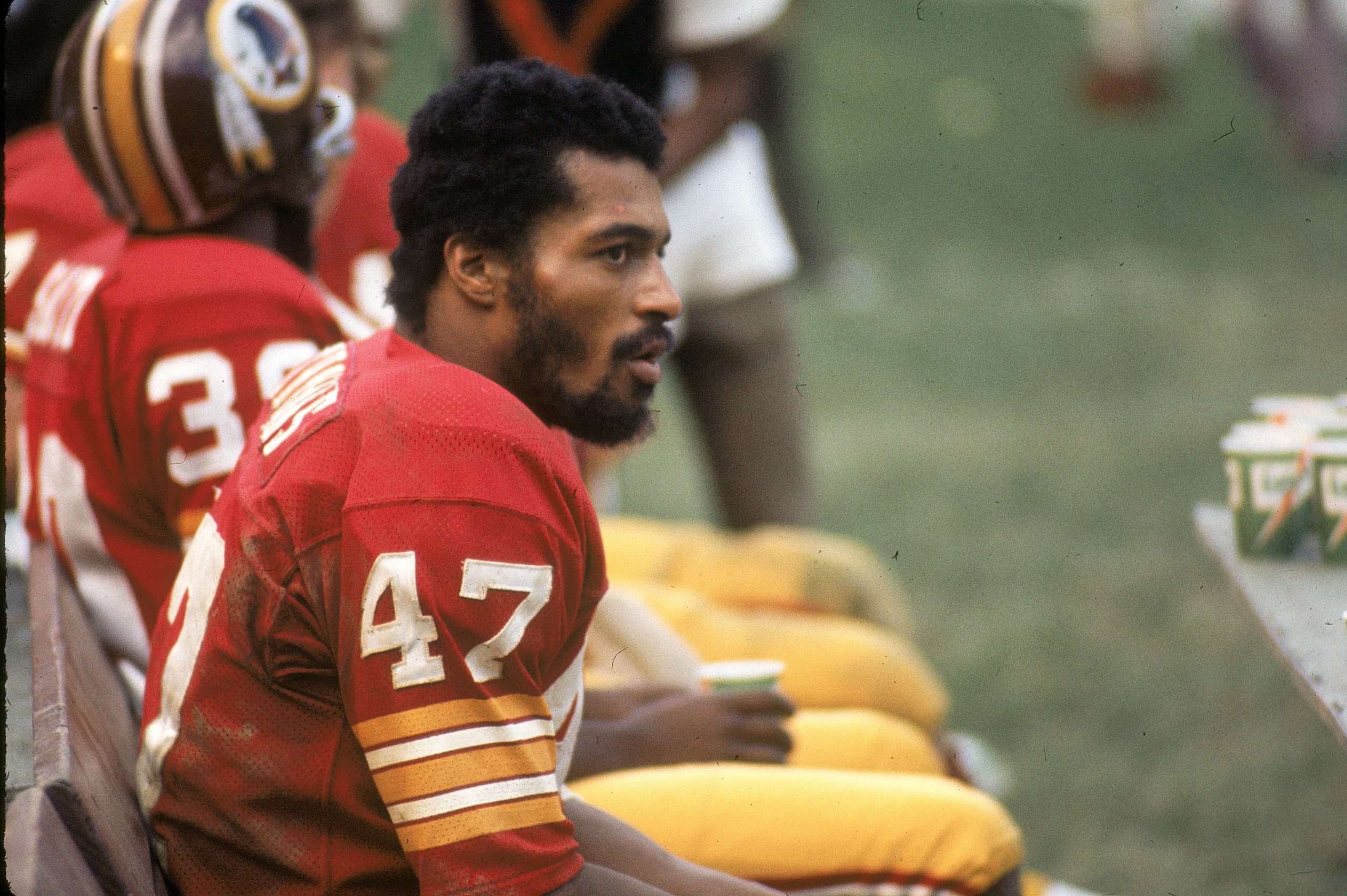 WASHINGTON, D.C. - SEPTEMBER 22: Running back Duane Thomas #47 of the Washington Redskins rests on the bench against the St. Louis Cardinals during an NFL game at RFK Stadium on September 22, 1974 in Washington, D.C. The Cardinals defeated the Redskins 17-10. (Photo by Nate Fine/Getty Images)