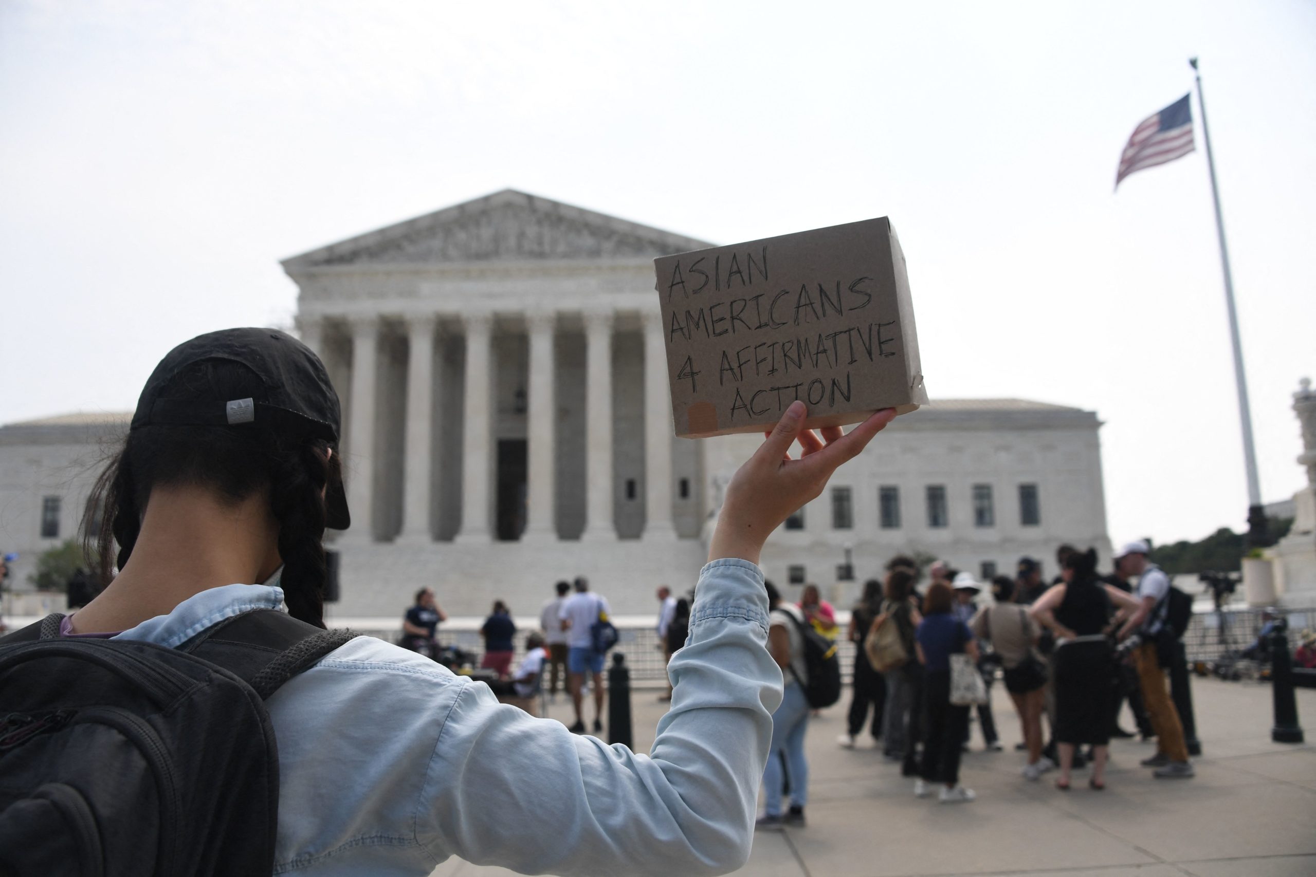 Affirmative action supporters demonstrate outside the US Supreme Court in Washington, DC, on June 30, 2023. The court on June 29 banned the use of race and ethnicity in university admissions, dealing a major blow to a decades-old practice that boosted educational opportunities for African-Americans and other minorities. (Photo by OLIVIER DOULIERY/AFP via Getty Images)