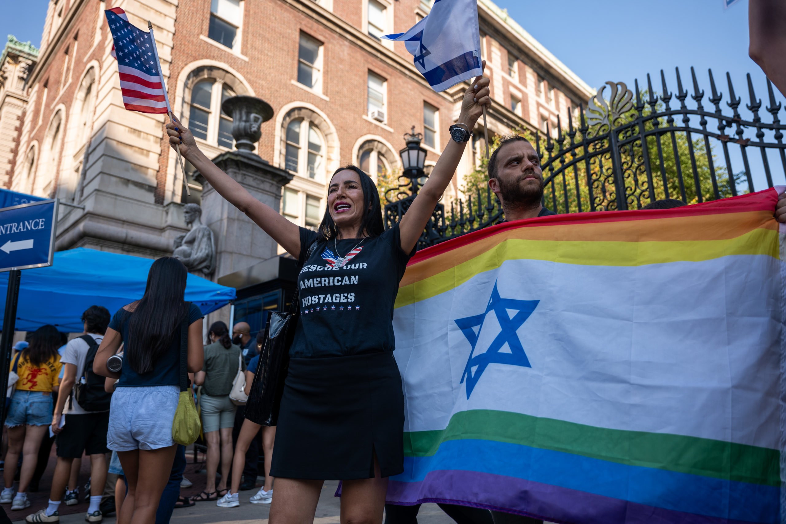 NEW YORK, NEW YORK—AUGUST 27: A small group of pro-Israel demonstrators gather in front of Columbia University on August 27, 2024, to hold an "Unmask Campus Hate" protest at the start of the academic year in New York City. Columbia was the site of a months-long tent camp of supporters of Palestine that was eventually broken up by the police. Many Israeli and Jewish students and faculty have complained and accused the university of allowing antisemitism to exist on the campus. (Photo by Spencer Platt/Getty Images)