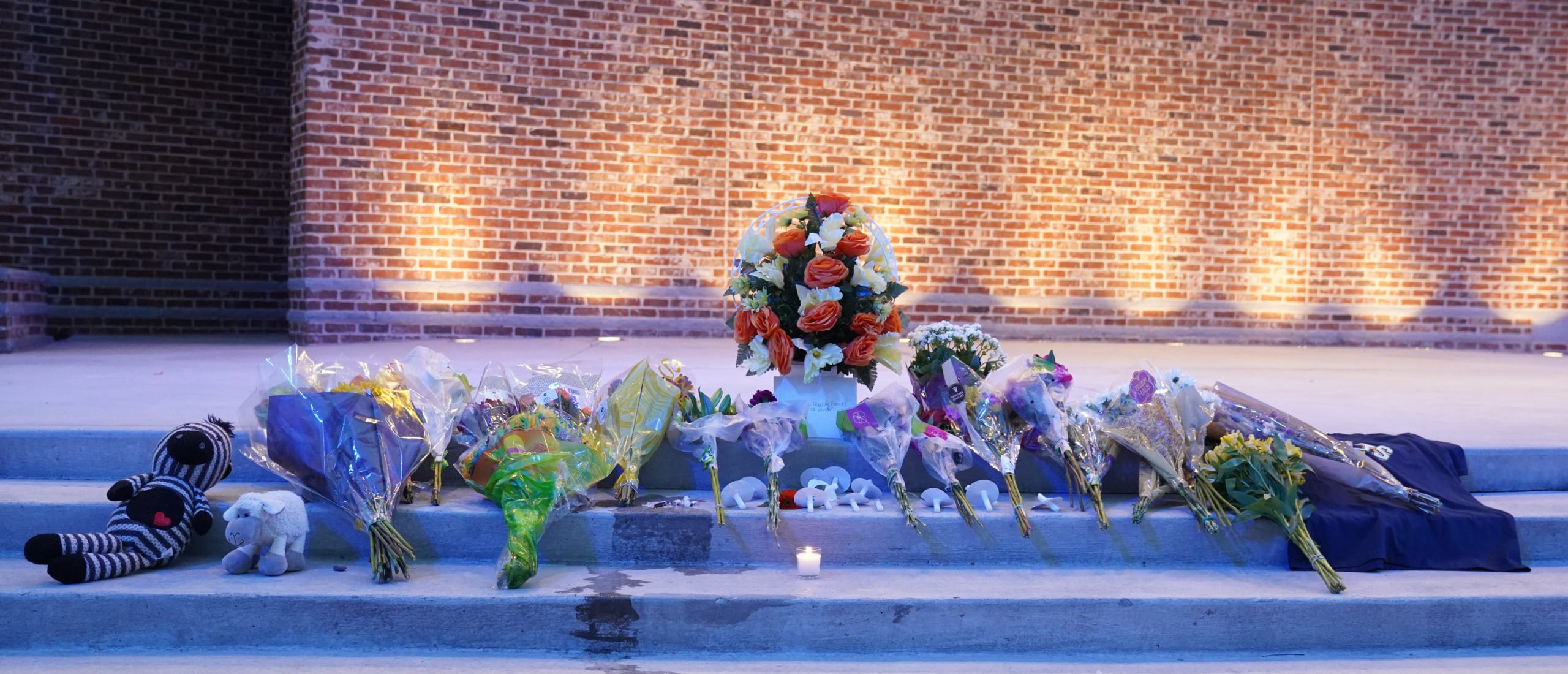 Flowers are laid out as students and faculty as well as community members gather for a vigil after a shooting at Apalachee High School on September 4, 2024 in Winder, Georgia. Four fatalities and multiple injuries have been reported, and a 14-year-old suspect is in custody according to authorities. (Photo by Megan Varner/Getty Images)