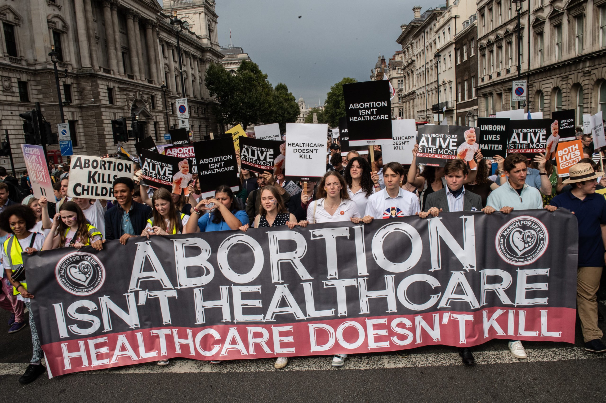 LONDON, ENGLAND - SEPTEMBER 7: Pro-life marchers proceed down Whitehall on September 7, 2024 in London, England. The Pro-life movement in the UK opposes abortion, saying that it isn't healthcare. (Photo by Guy Smallman/Getty Images)