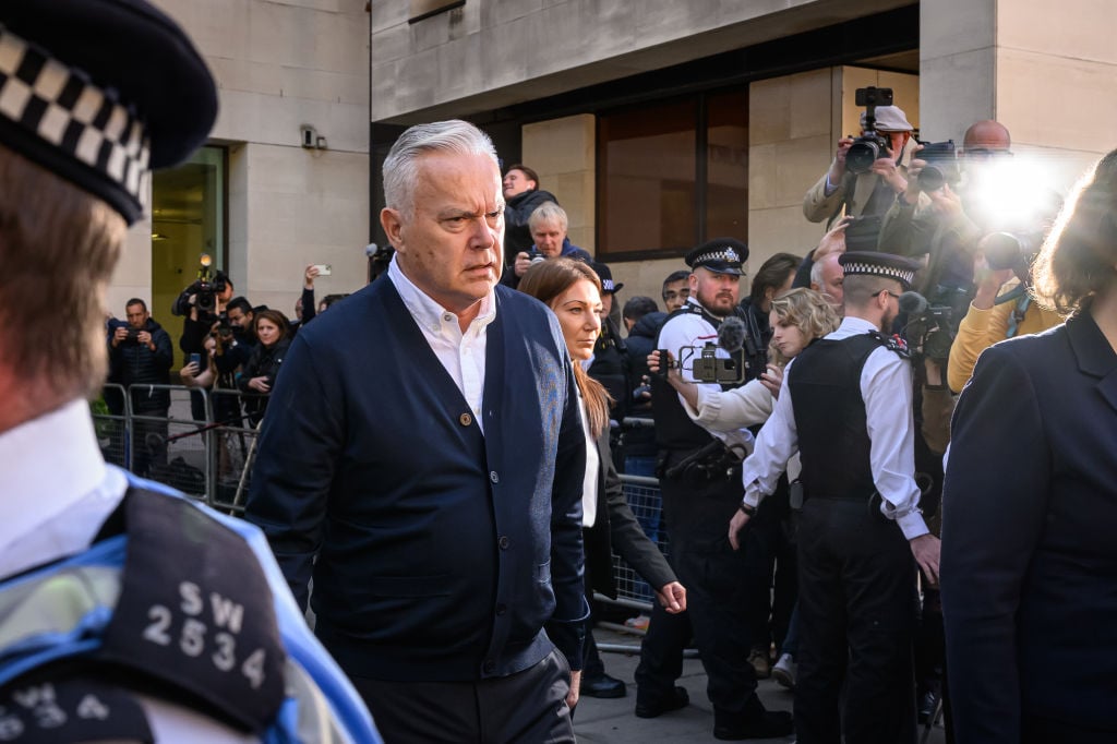 LONDON, ENGLAND - SEPTEMBER 16: Former BBC broadcaster Huw Edwards leaves court after receiving a six-month jail sentence suspended for two years for accessing indecent images of children at Westminster Magistrates' Court on September 16, 2024 in London, England. On July 31, 2024, Veteran News Reader Huw Edwards pleaded guilty to three counts of making indecent pictures of children between 2020 and 2022, 37 images were shared on WhatsApp. He was arrested in November 2023. Edwards was the BBC's Ten O'clock News anchor and was chosen to announce the death of HM Queen Elizabeth II to the nation. (Photo by Leon Neal/Getty Images)