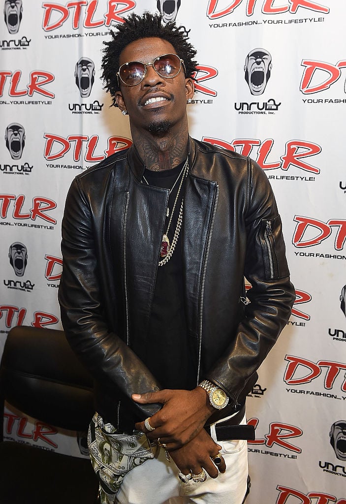 ATLANTA, GA - NOVEMBER 24: Rich Homie Quan attends the Rich Homie Quan "Feed The Streets" Campaign at DTLR South Dekalb Mall on November 24, 2014 in Atlanta, Georgia. (Photo by Paras Griffin/Getty Images)